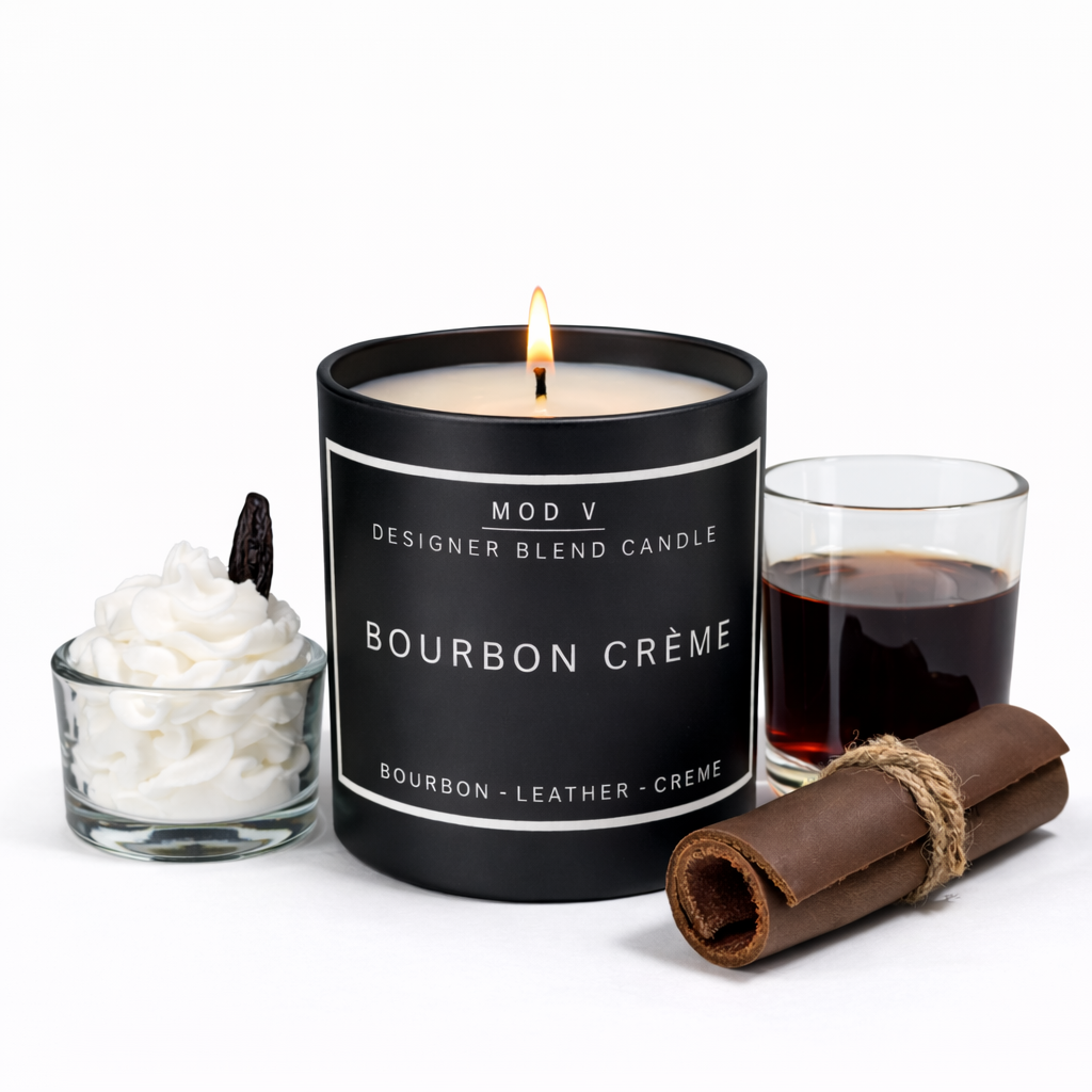 Bourbon Crème candle with a glass of bourbon, whipped cream, and a cinnamon stick on a white background
