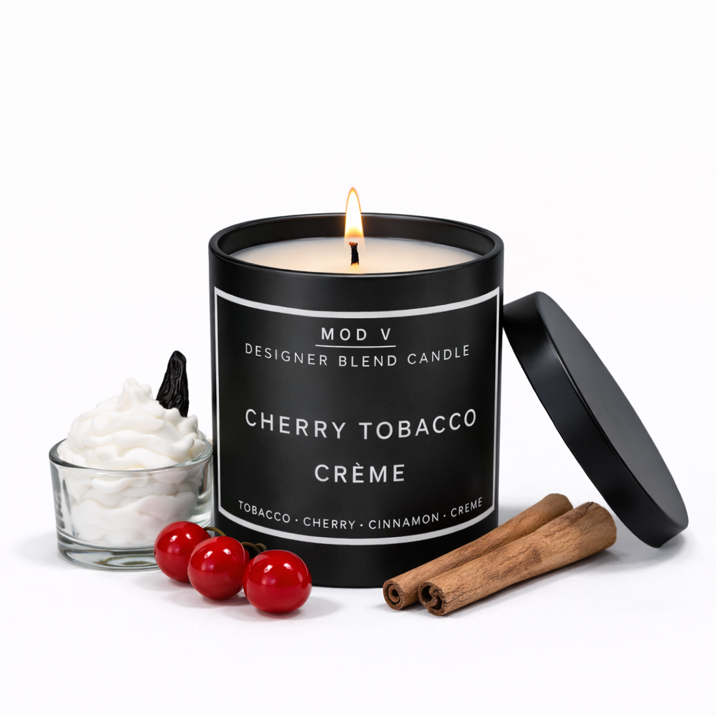 Candle labeled 'Cherry Tobacco Crème' with ingredients on a white background