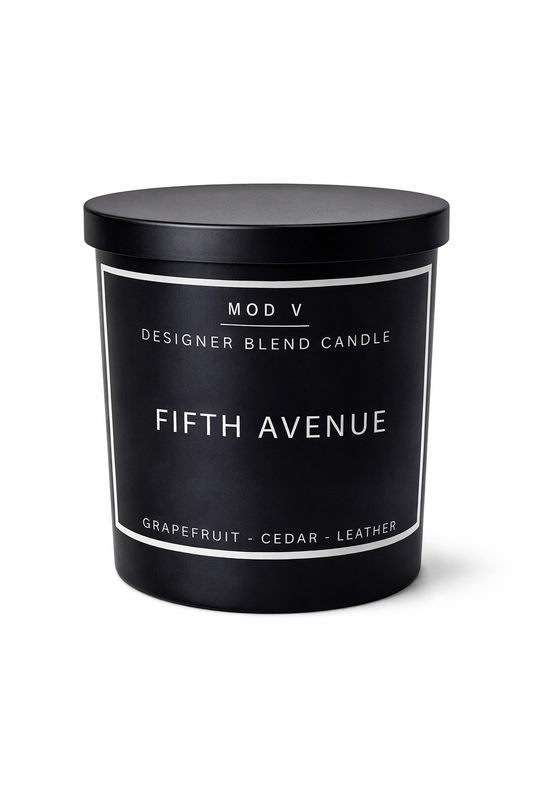 Black candle with 'Fifth Avenue' label on a white background