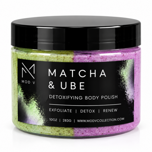 A jar of MOD V Matcha & Ube Detoxifying Body Polish, featuring a split black label with green and purple exfoliating body powder visible through the clear container, set against a plain white background.