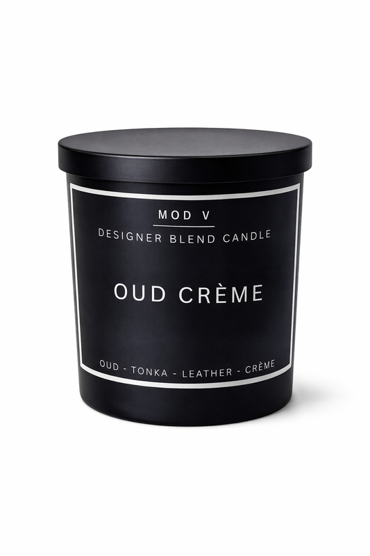 Black candle container labeled 'Oud Crème' with 'Mod V' branding on a white background