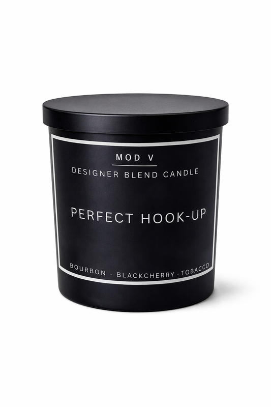 Black candle with 'Perfect Hook-Up' label on a white background