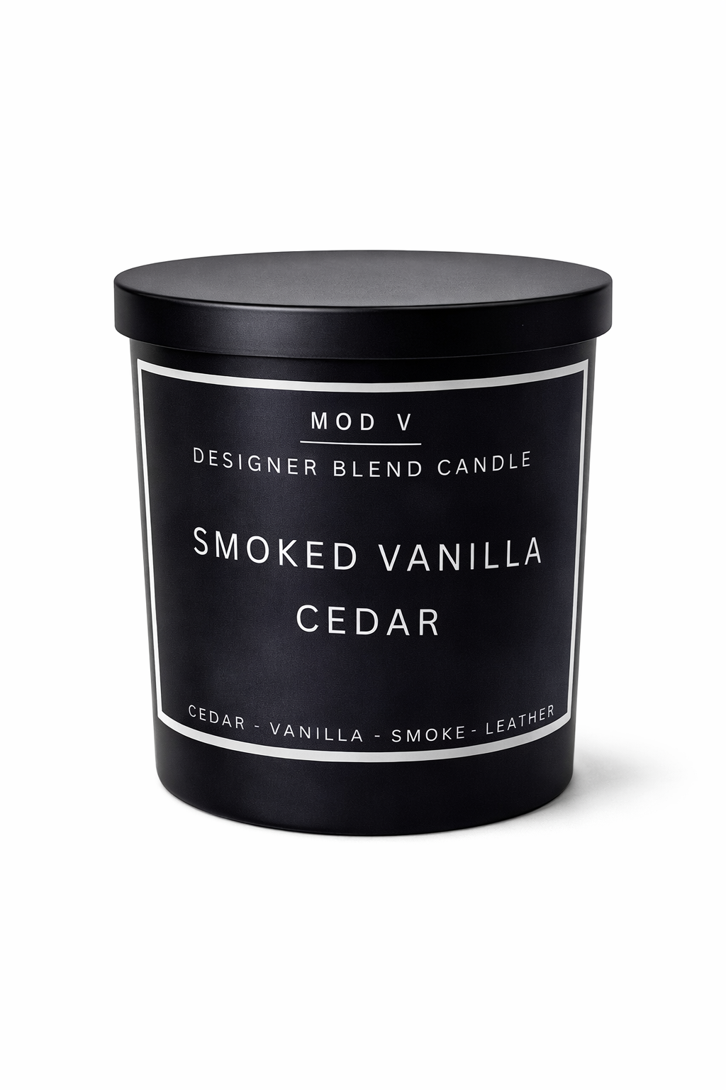 Black candle container with 'Smoked Vanilla Cedar' fragrance on a white background